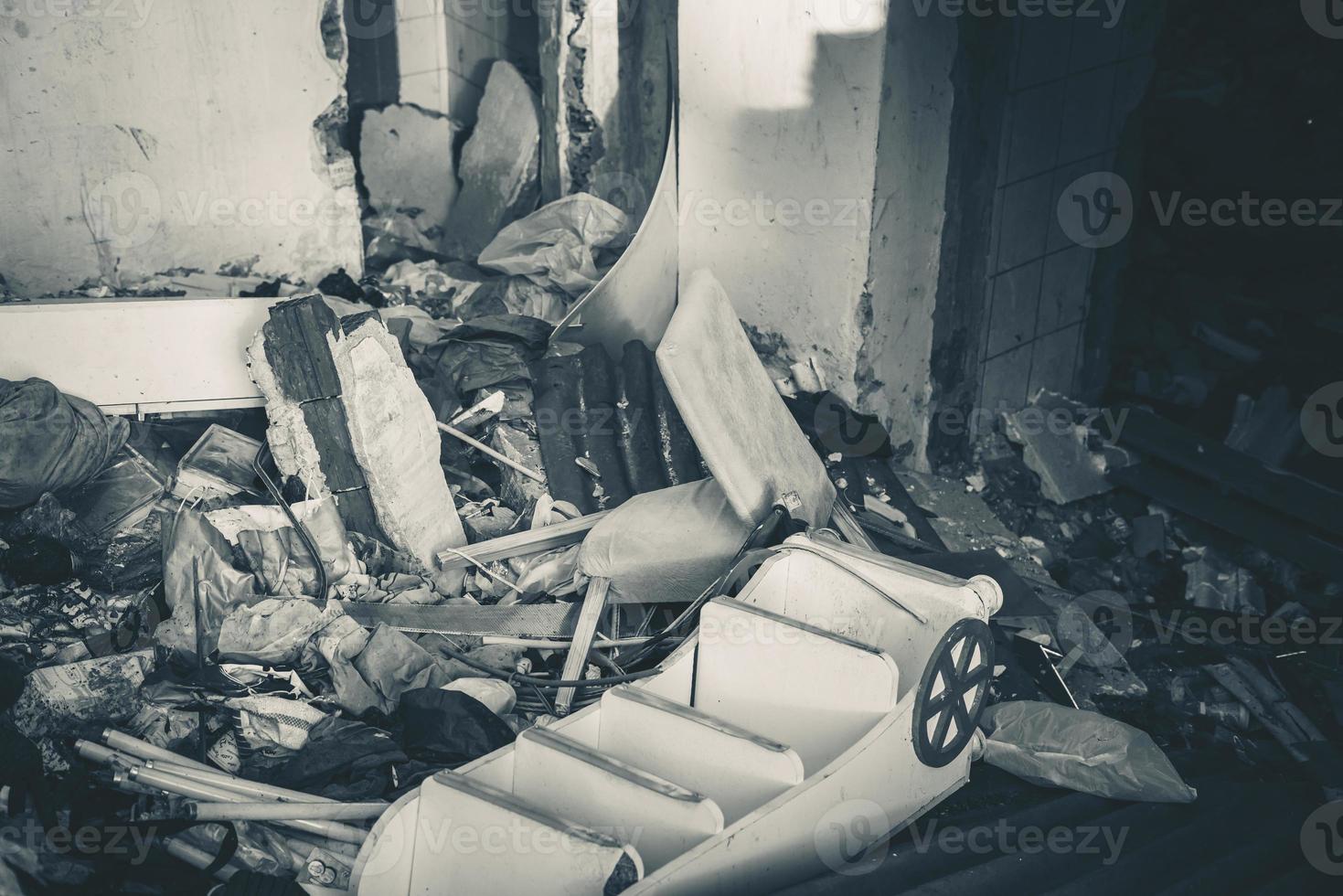 Houses and fields in ruins, demolished, abandoned and junkyard photo