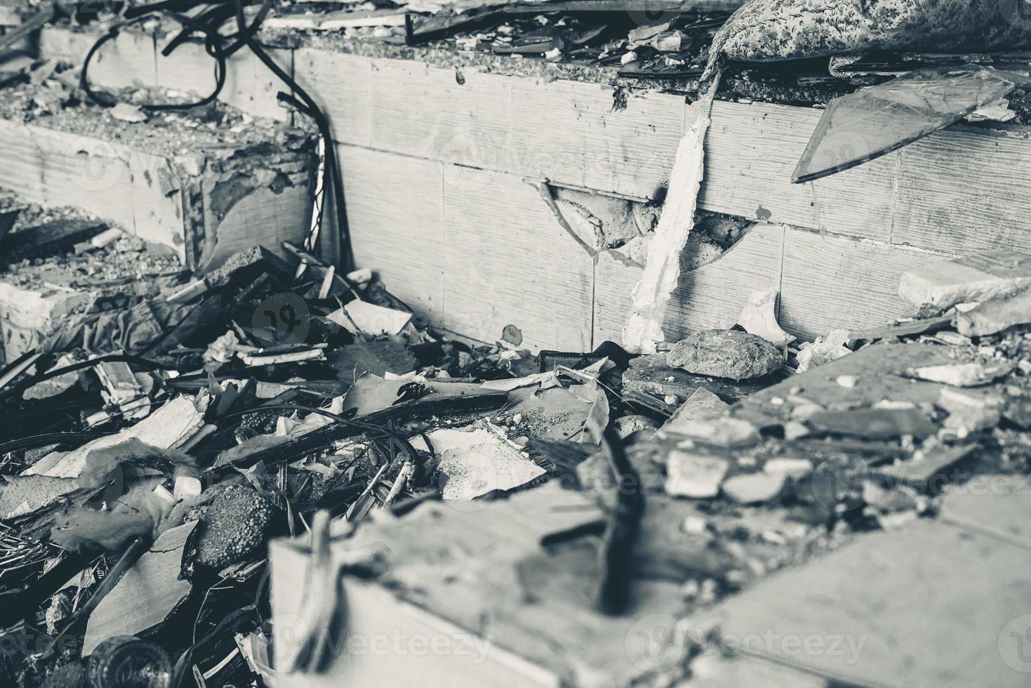 Houses and fields in ruins, demolished, abandoned and junkyard photo