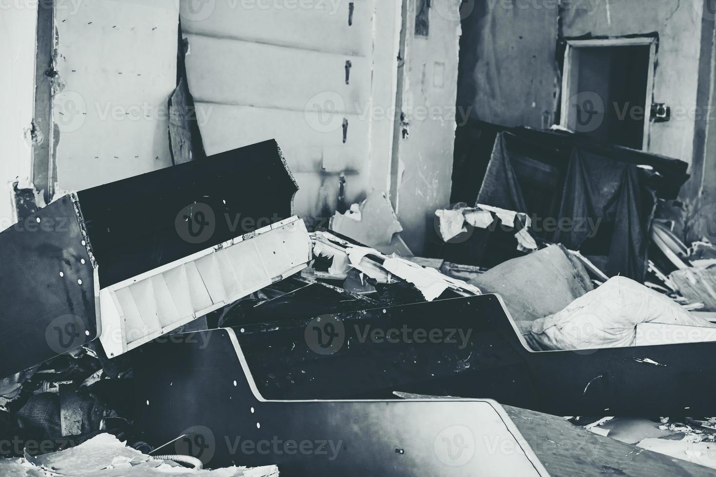 Houses and fields in ruins, demolished, abandoned and junkyard photo