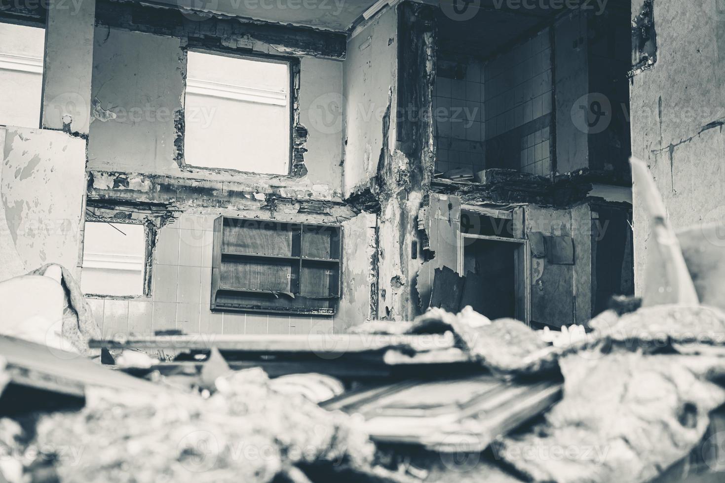 Houses and fields in ruins, demolished, abandoned and junkyard photo