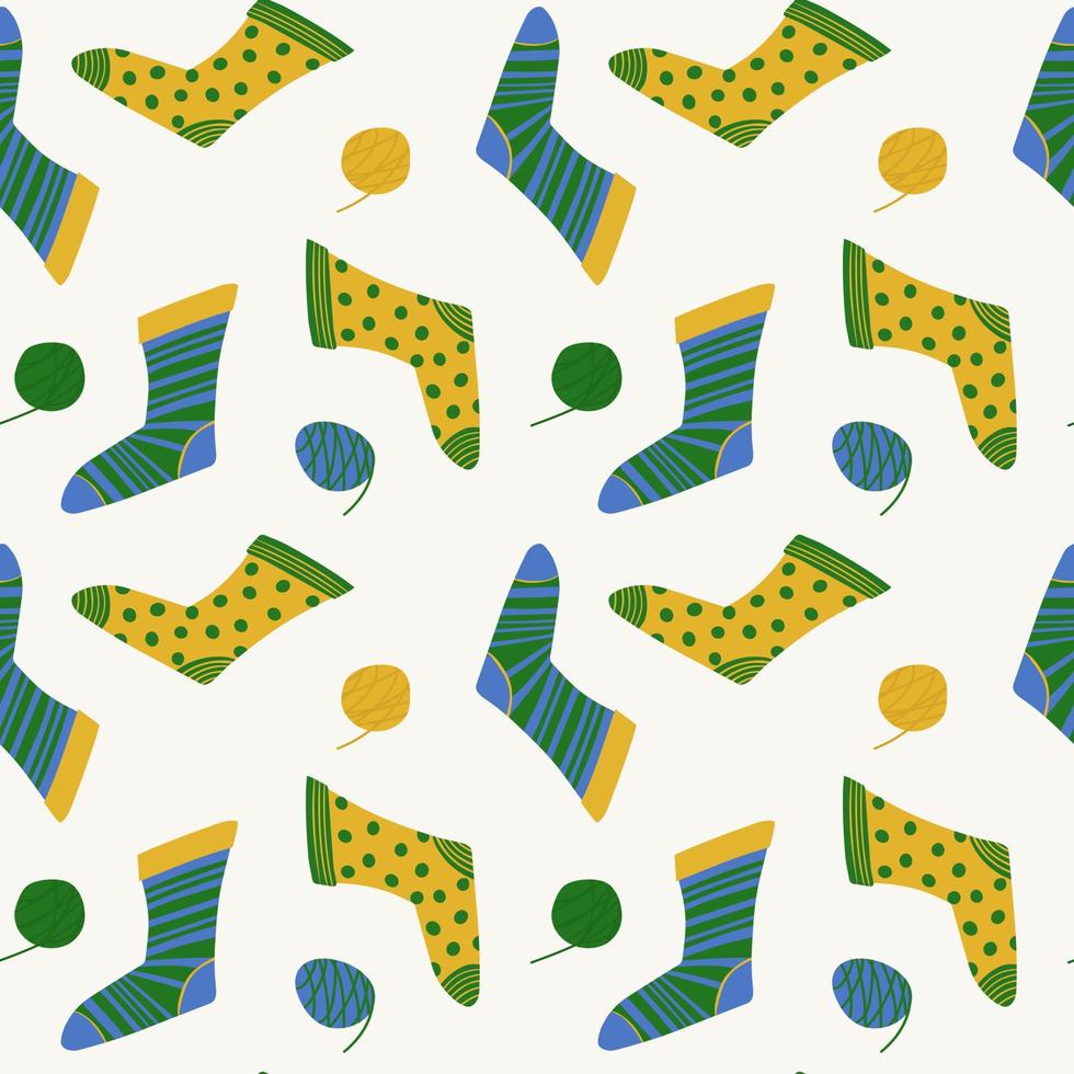 Seamless pattern of cozy knitted socks vector