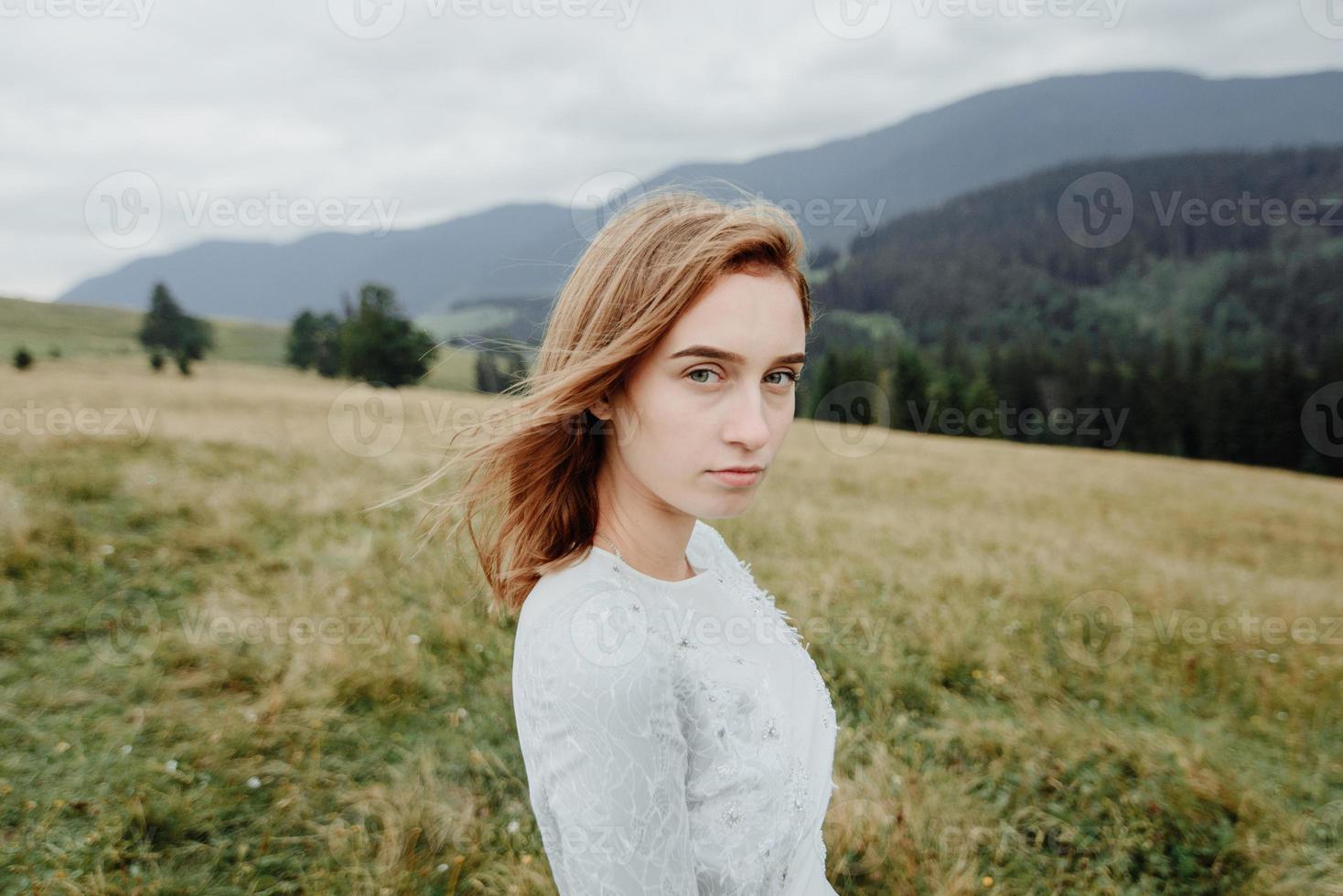 Photoshoot of the bride in the mountains. Boho style wedding photo. photo