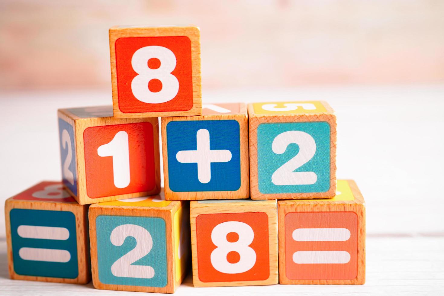 Number wood block cubes for learning Mathematic, education math concept. photo