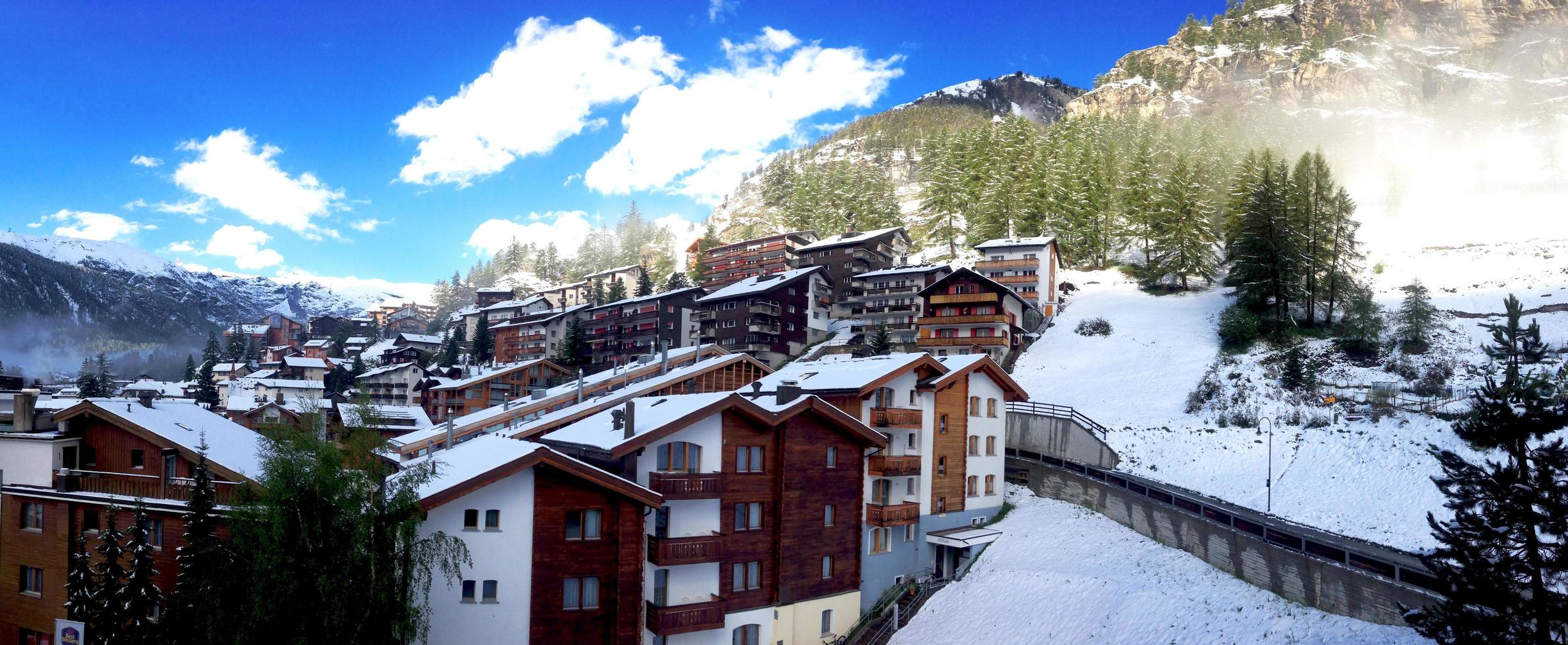 panorama view of snow mountains and old town city Zermatt, Switzerland, Europe photo