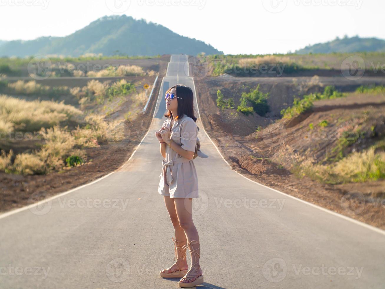 Woman on road photo