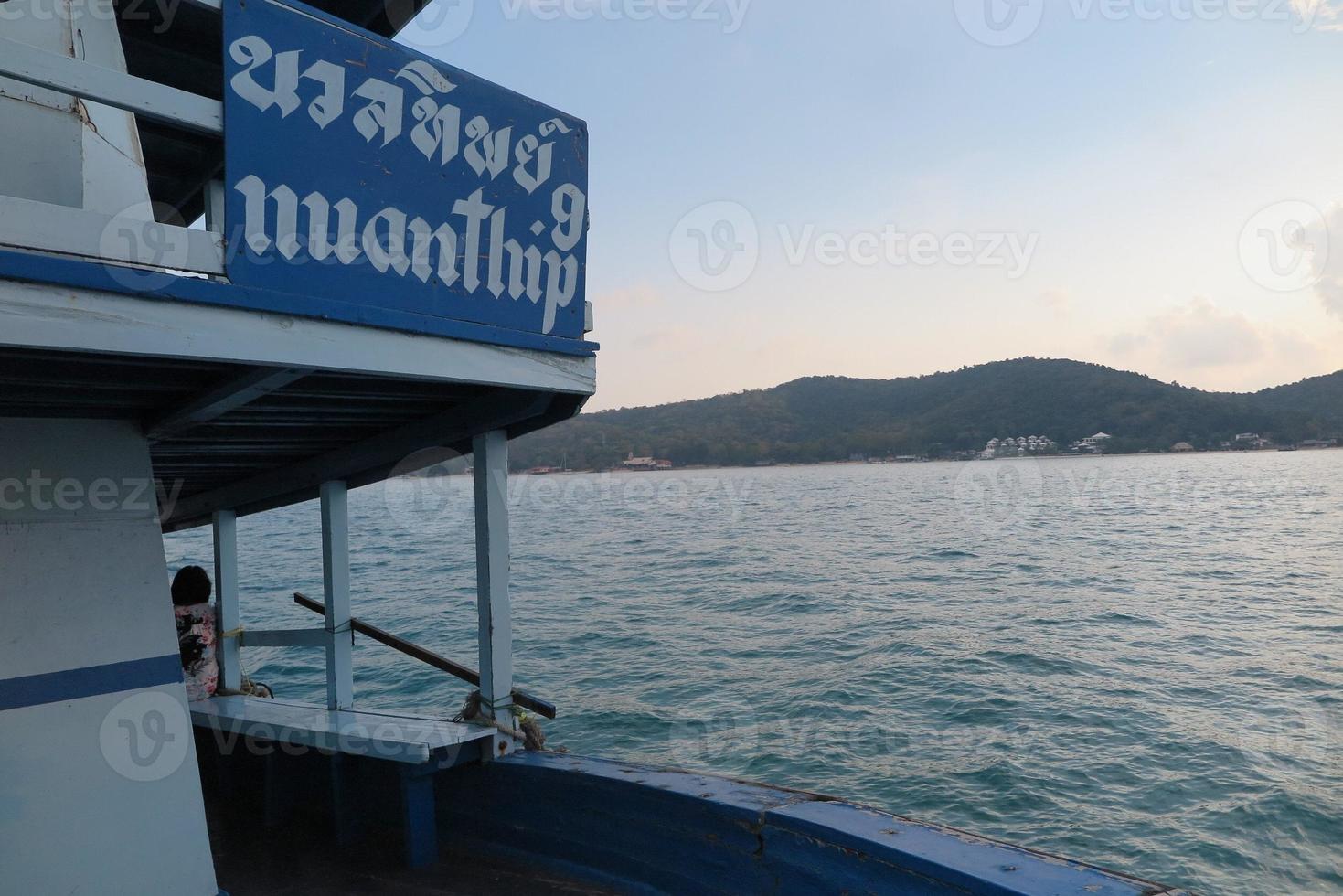 wooden label and ocean photo