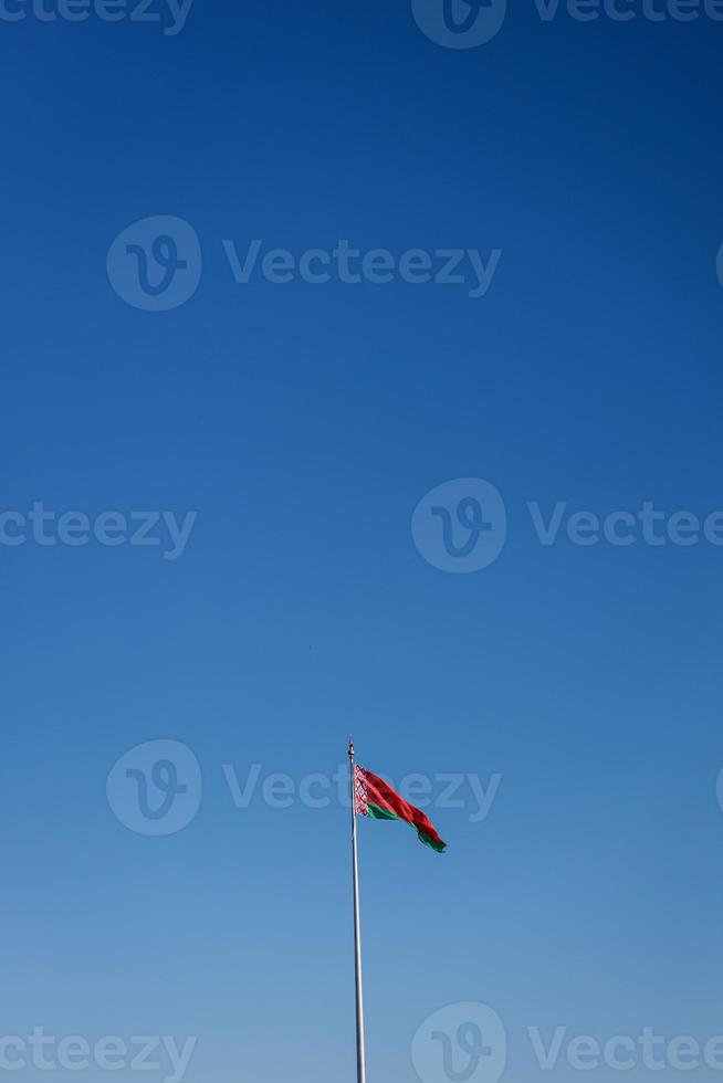 Flag of Belarus with blue sky photo