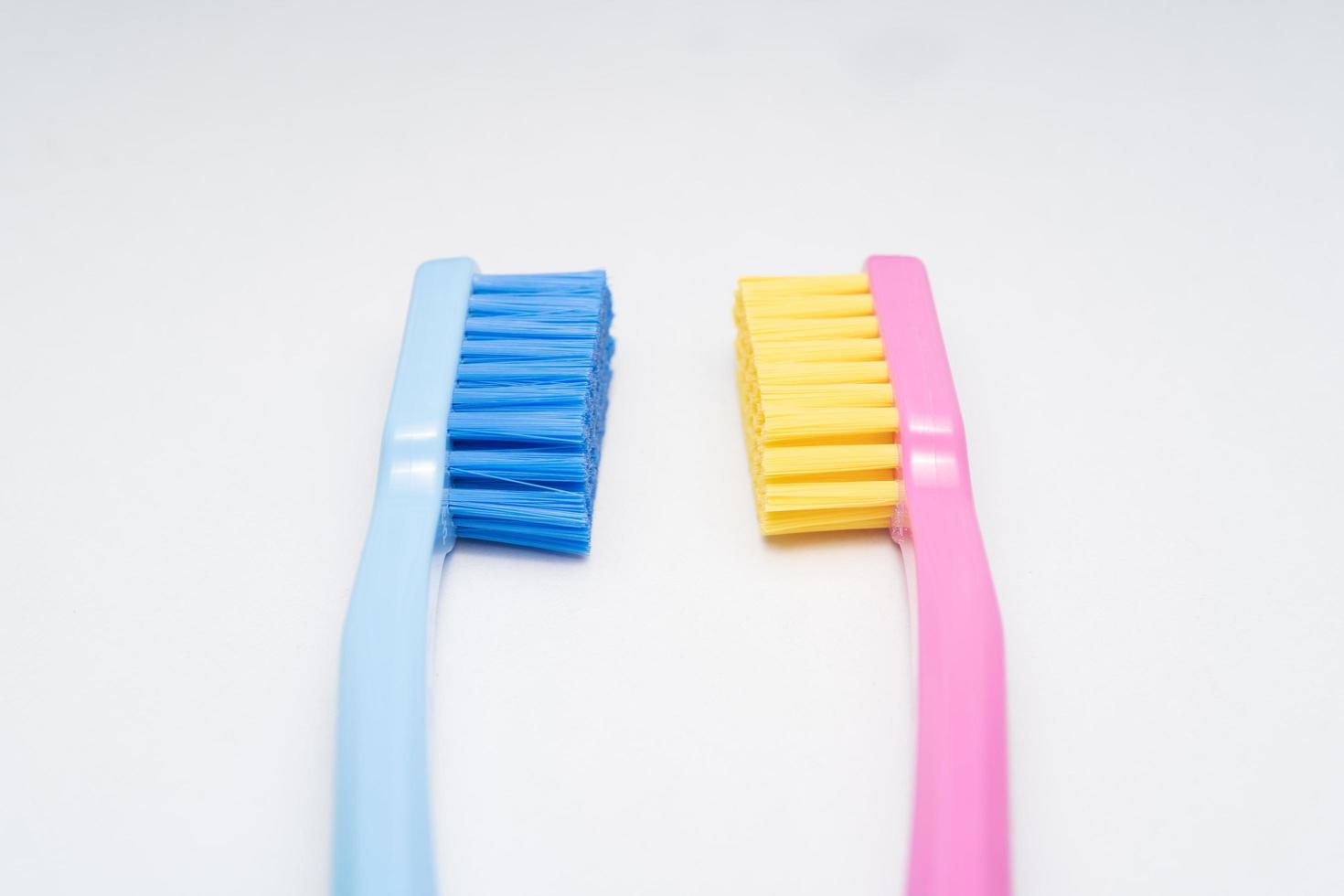A conceptual of a couple toothbrush in love. Toothbrushes convey the human relationship between a man and a woman. photo