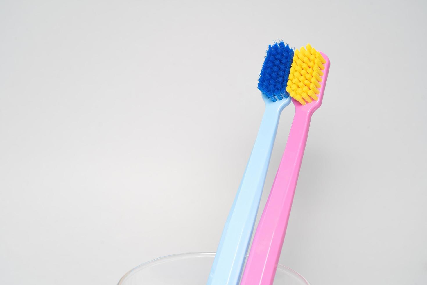 A conceptual of a couple toothbrush in love. Toothbrushes convey the human relationship between a man and a woman. photo