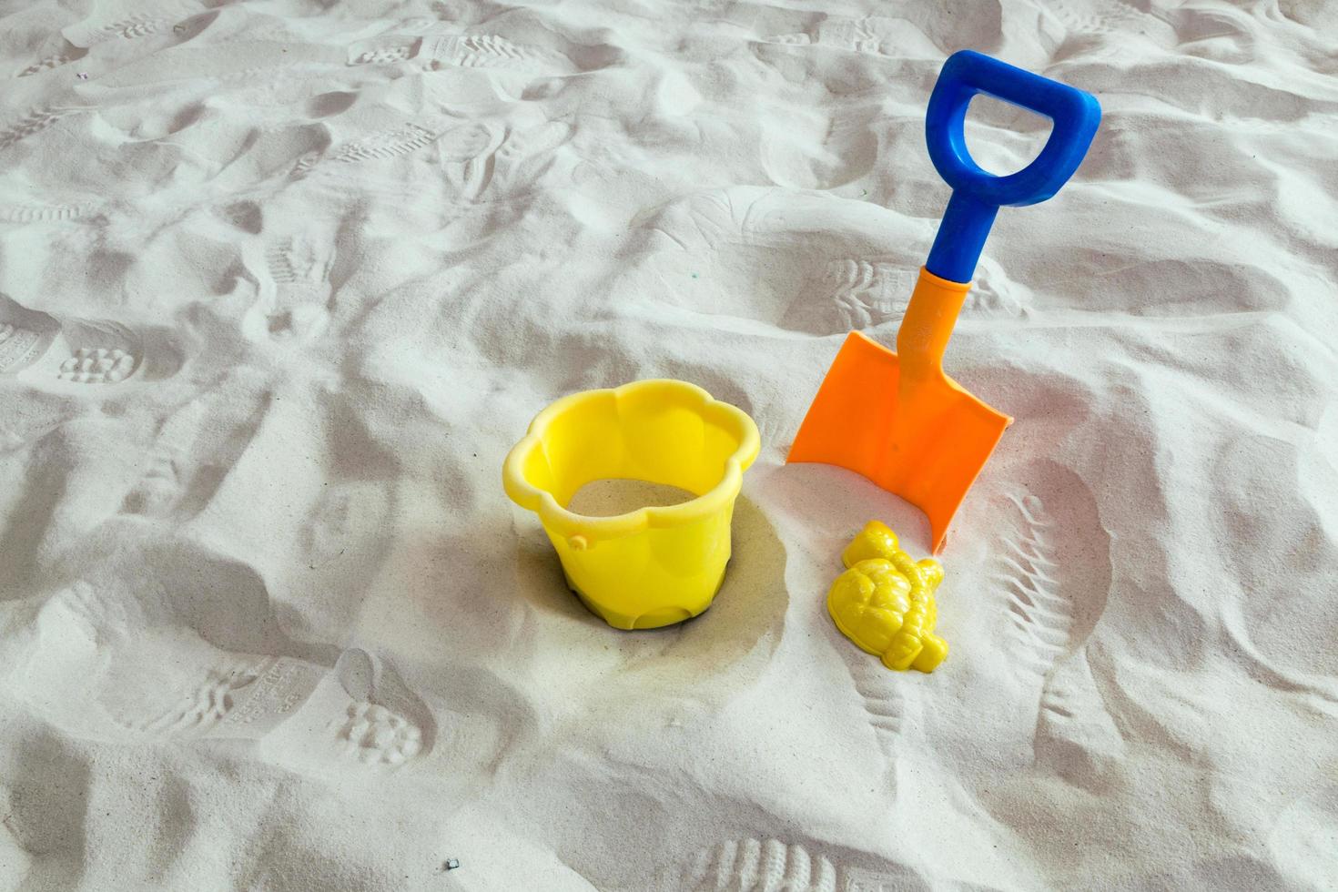 Toy Bulldozer on Sand photo