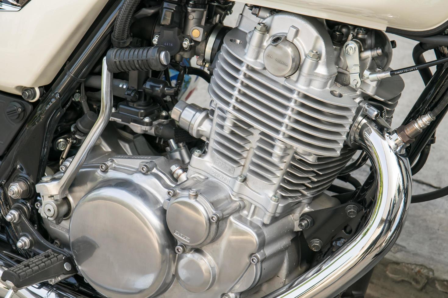 Closeup of chromed motorcycle engine photo