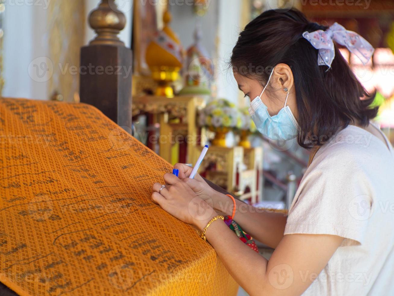 Woman and buddhist photo