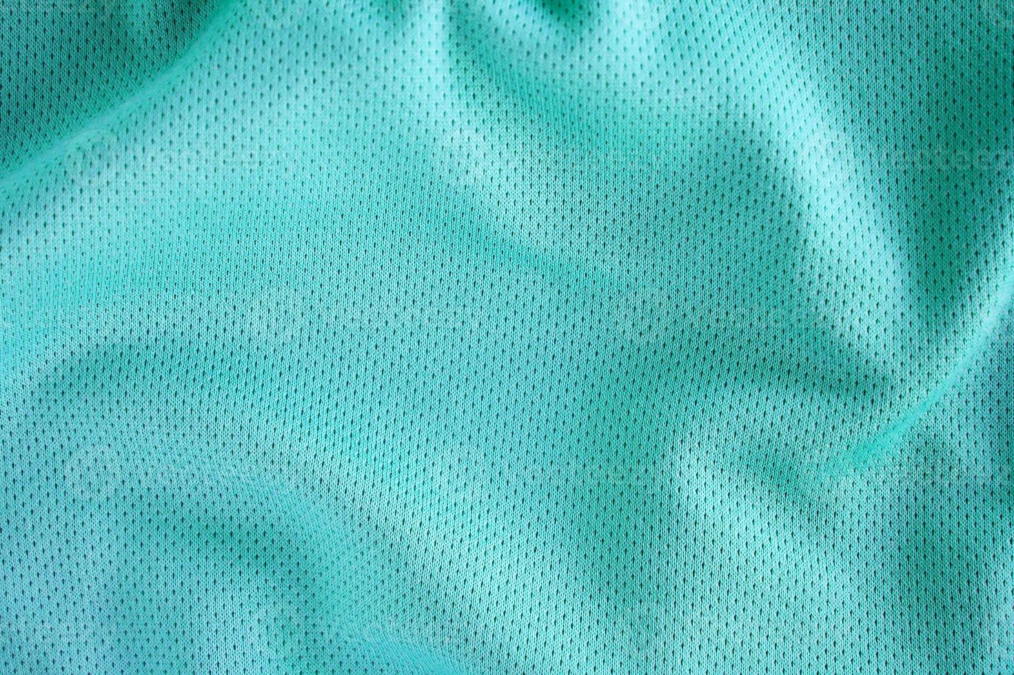 Sport clothing fabric texture background, top view of cloth textile surface photo