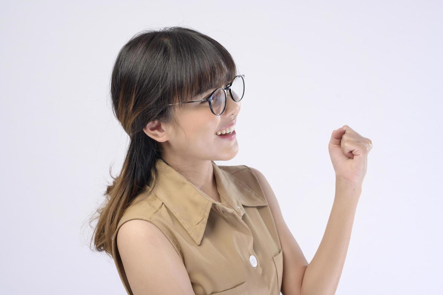 Beautiful woman wearing glasses over white background studio photo