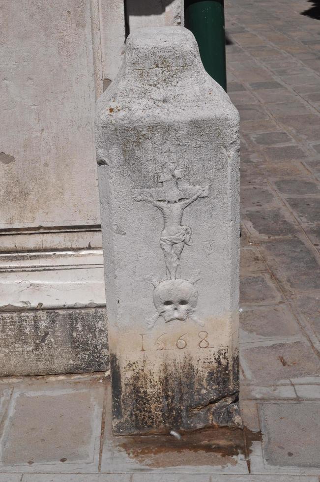 Ancient mask in Venice, Italy photo