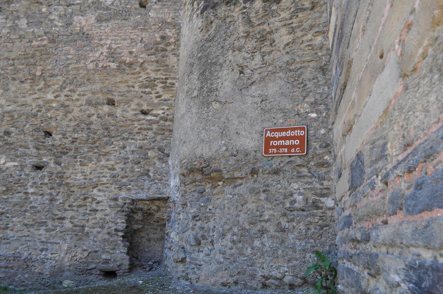 Roman aqueduct in Susa photo