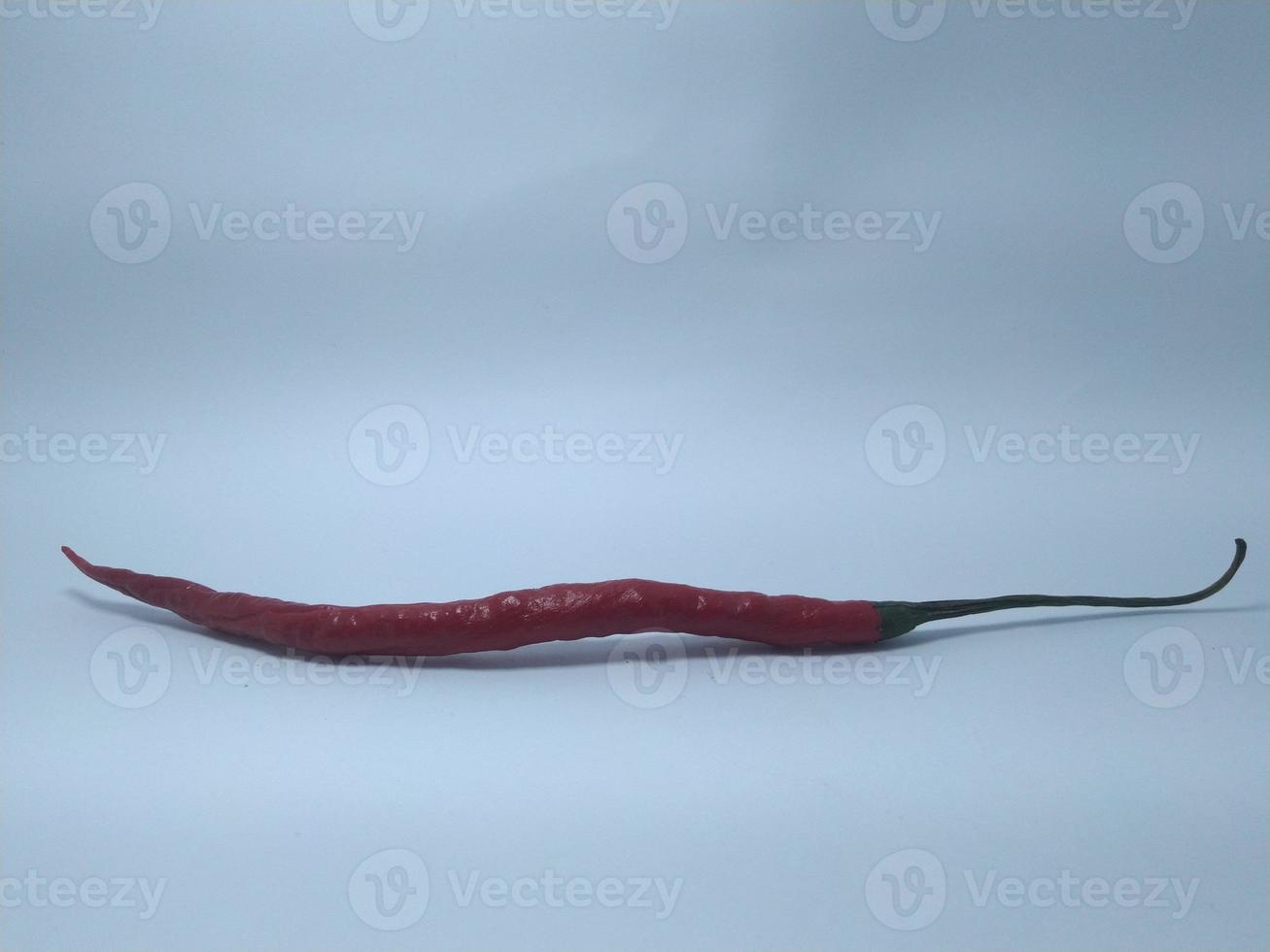 Red Chili pepper is isolated on a white background. photo