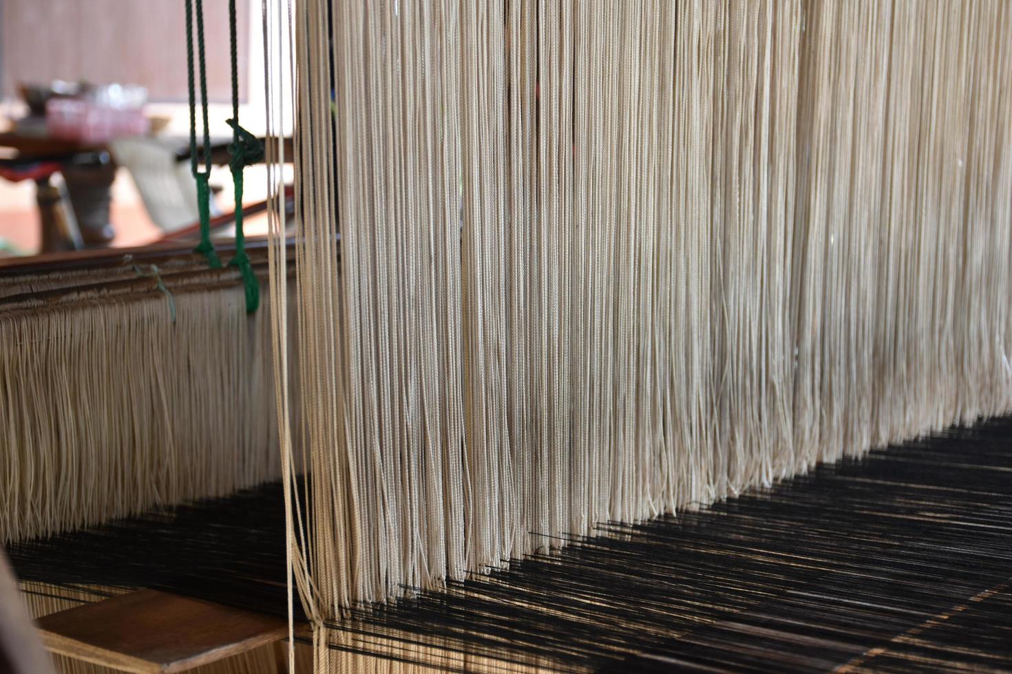 Small weaving looms made from wood used for weaving in rural Thai households. photo