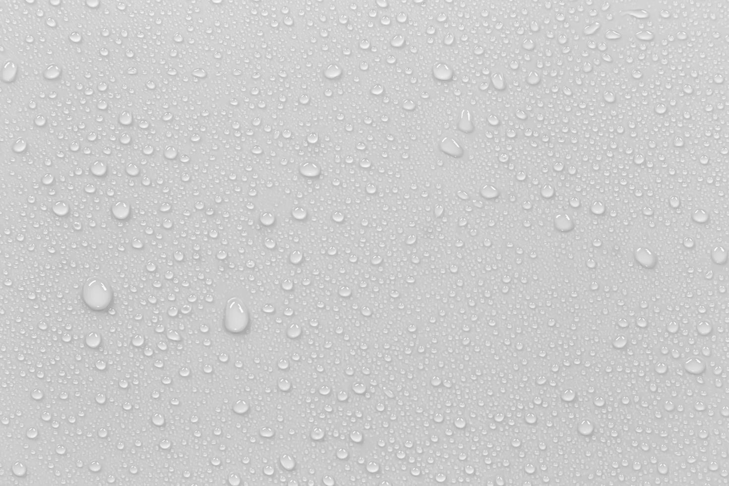 el concepto de gotas de lluvia que caen sobre un fondo gris superficie blanca húmeda abstracta con burbujas en la superficie gotas de agua de gotas de agua pura realistas para el diseño creativo de pancartas foto