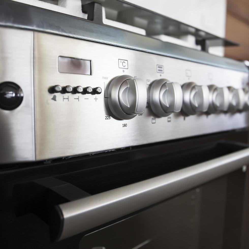 Close-up of the setting button of the electric oven. photo