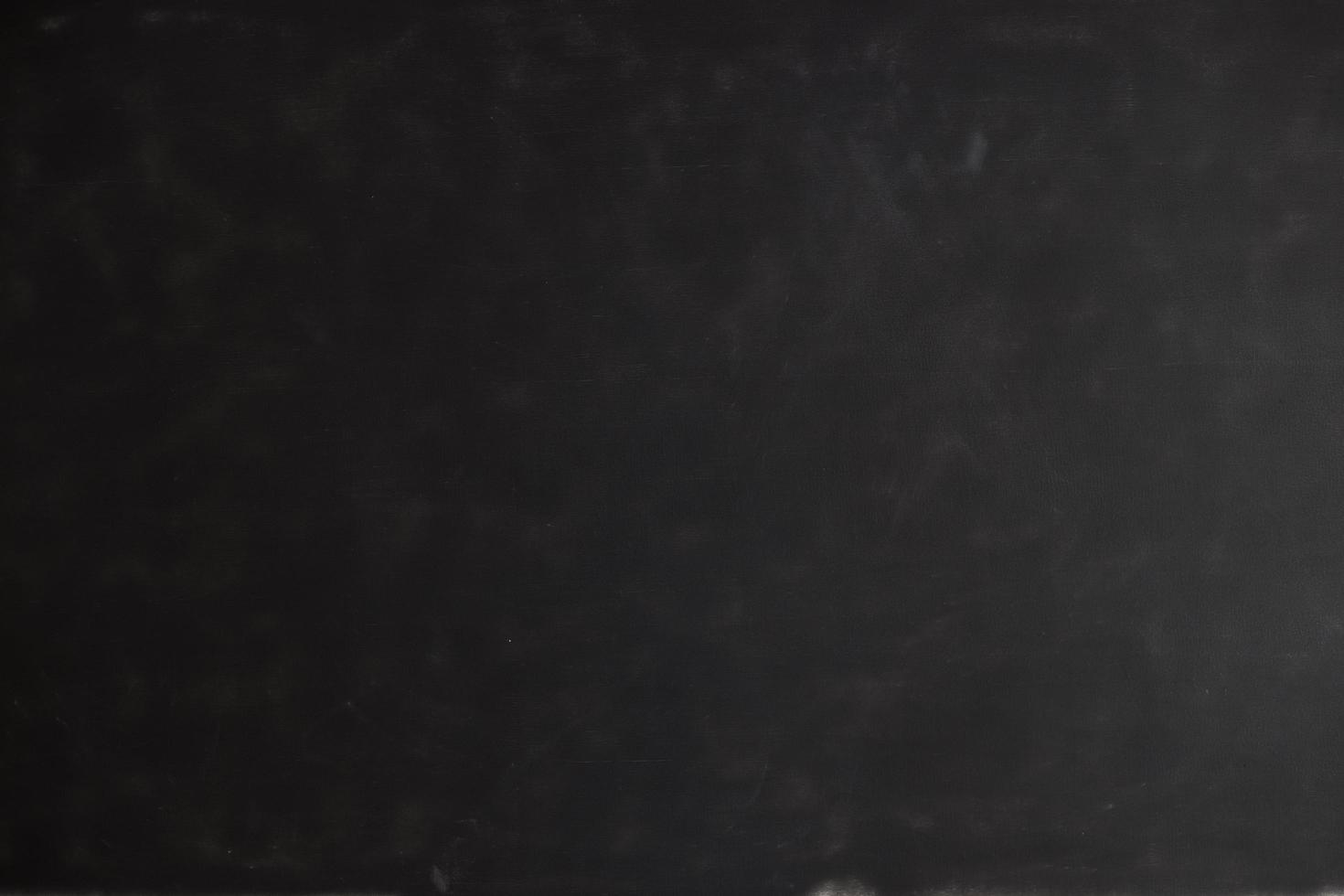 Chalk rubbed out on blackboard photo