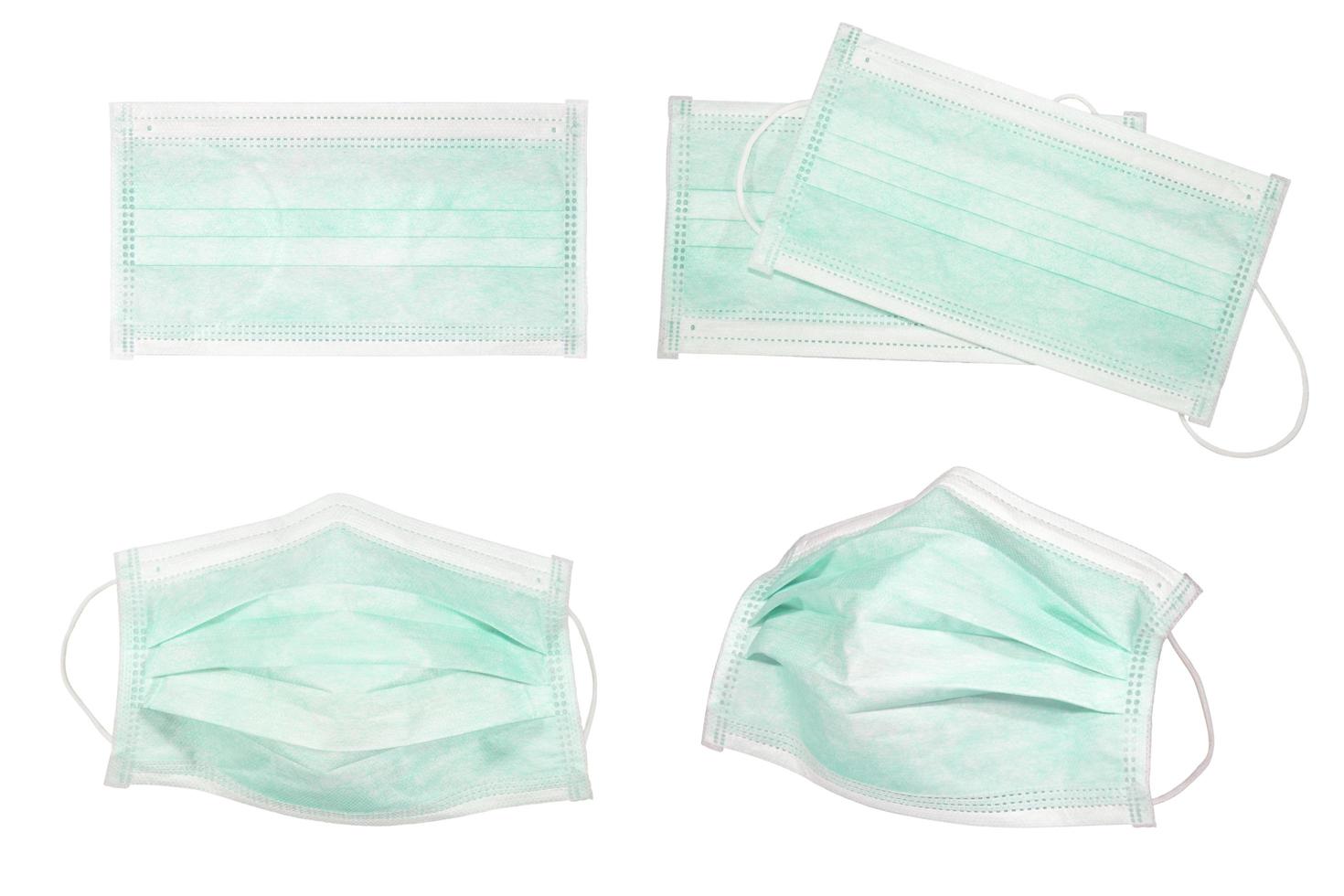 Standard 3-ply face mask with ear strap isolated on a white background, covid-19 virus prevention concept photo