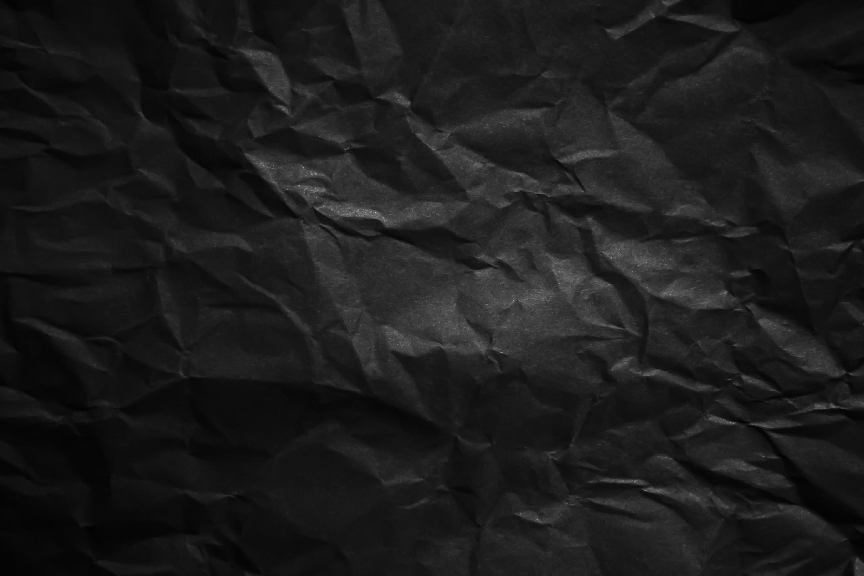Textured crumpled black paper background. 6893583 Stock Photo at Vecteezy