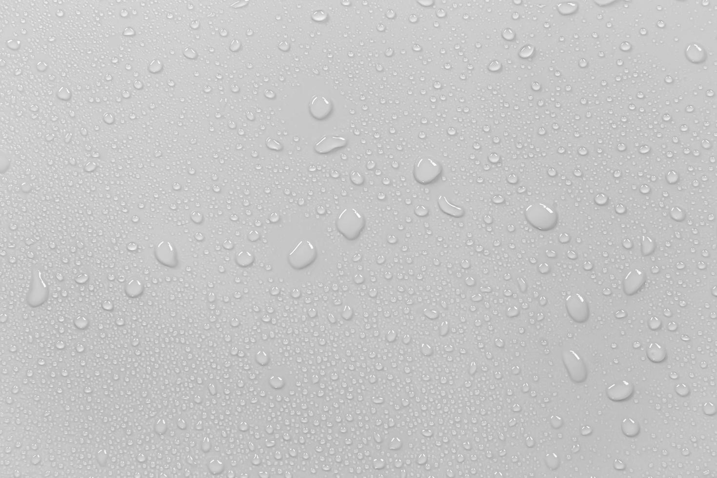 The concept of raindrops falling on a gray background Abstract wet white surface with bubbles on the surface Realistic pure water droplet water drops for creative banner design photo
