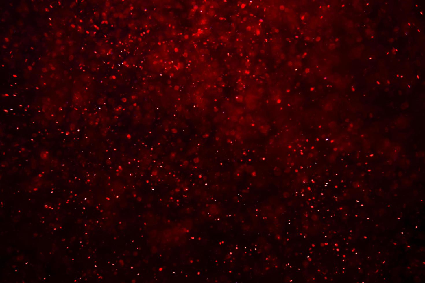 fondo de bokeh rojo con luz de bokeh de desenfoque suave. foto