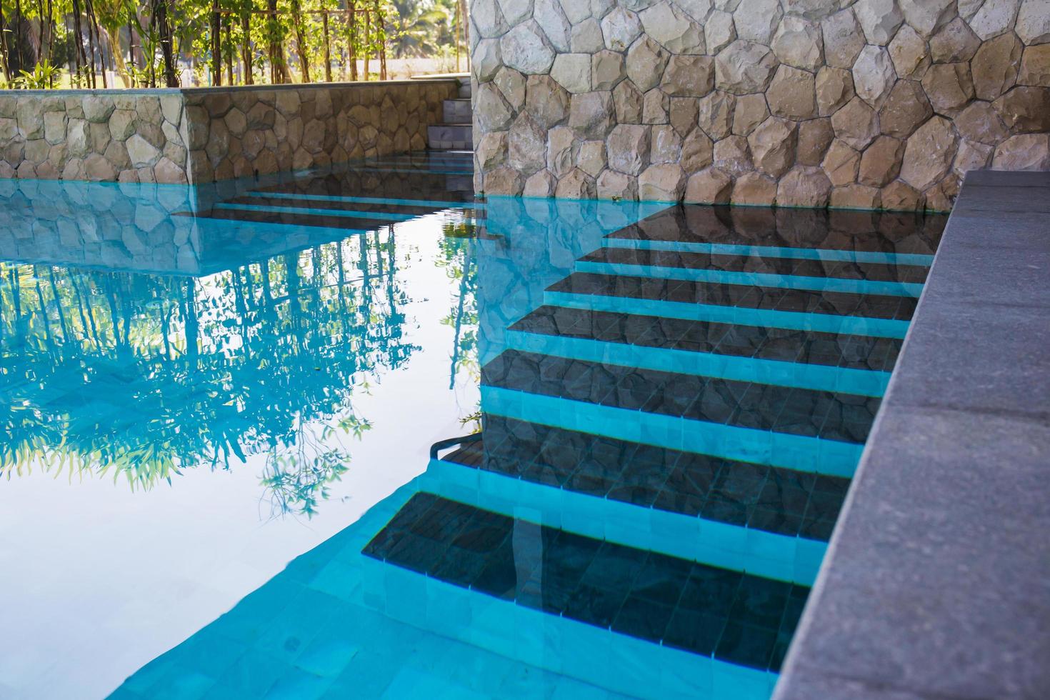 Step ladder of the swimming pool photo