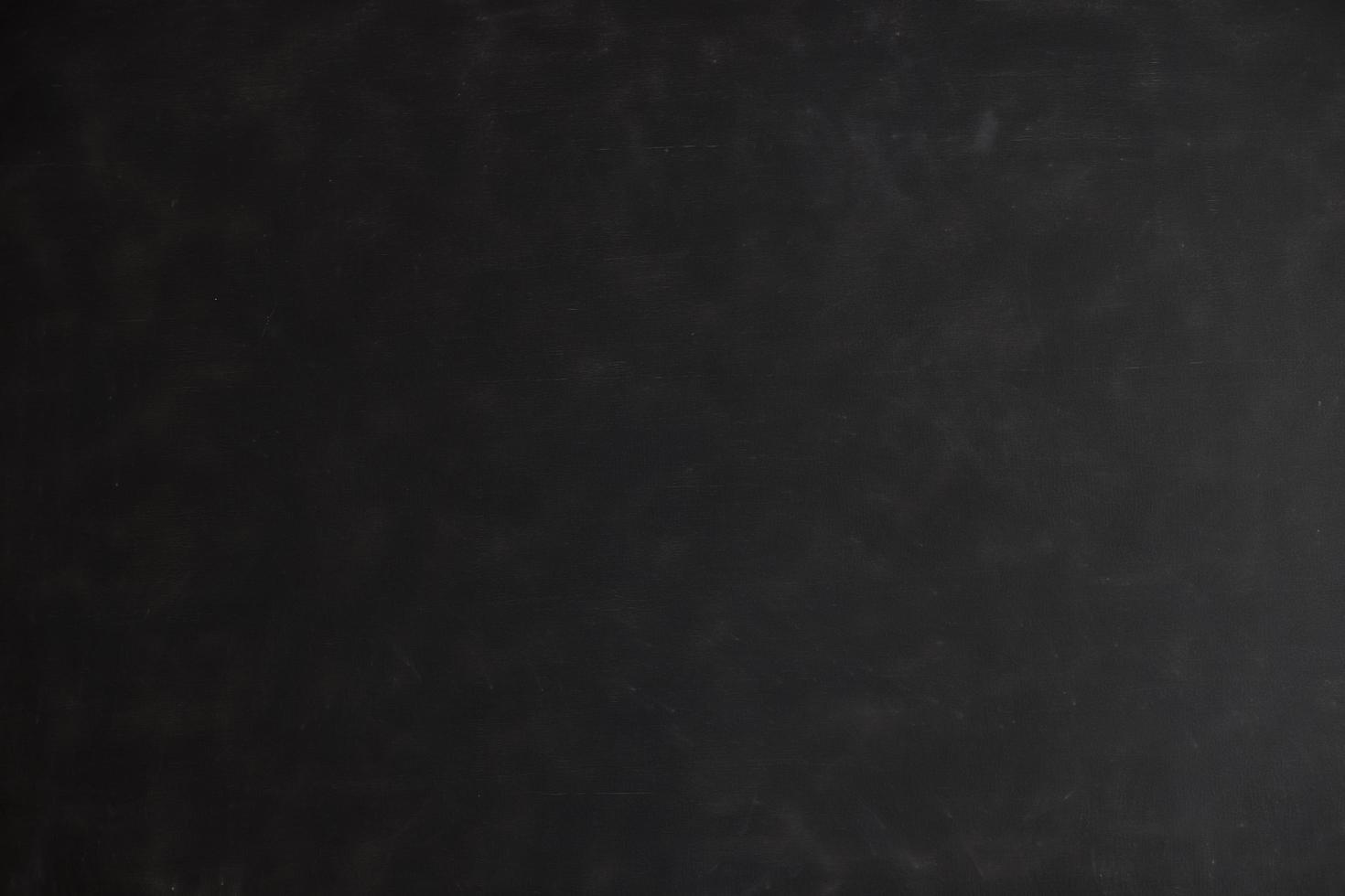 Chalk rubbed out on blackboard photo