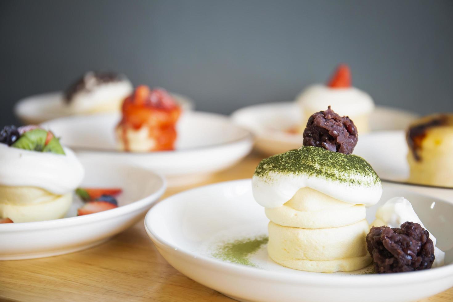 Japanese-style pancakes on a wooden table are ready to serve. photo