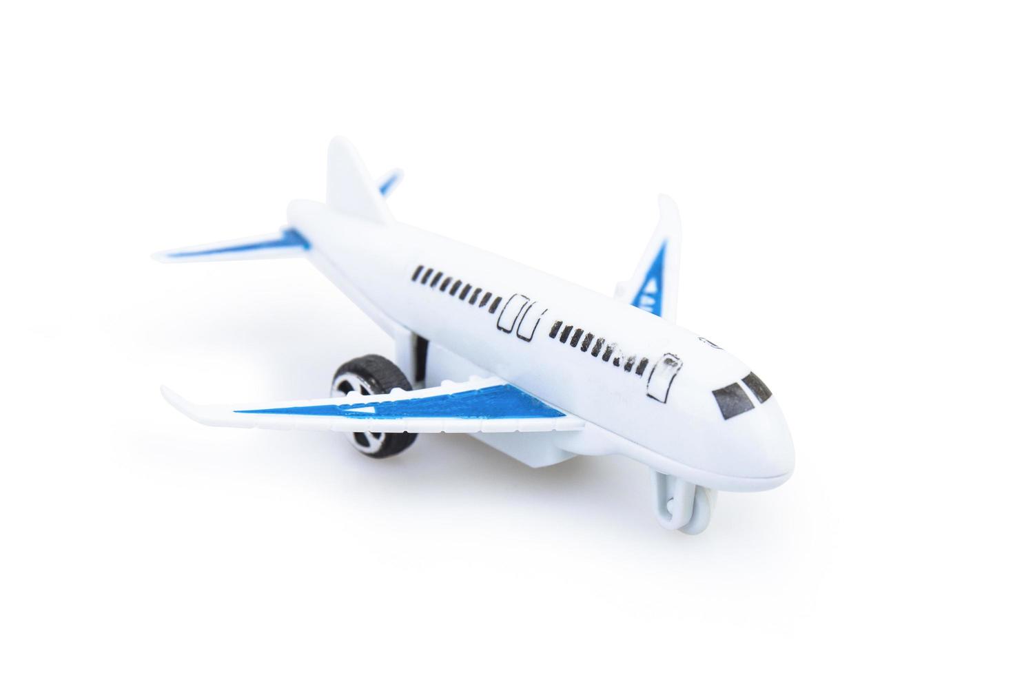 plastic toy plane isolated on white background. photo