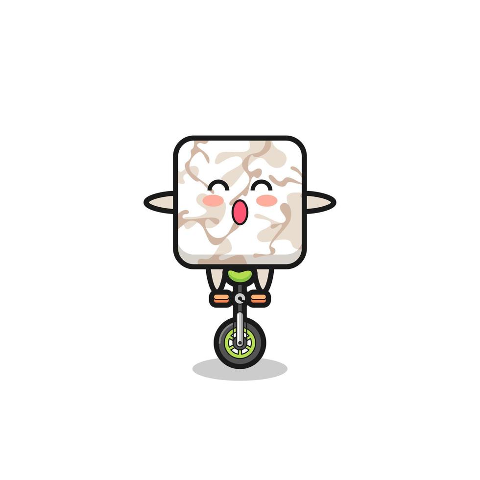 The cute ceramic tile character is riding a circus bike vector