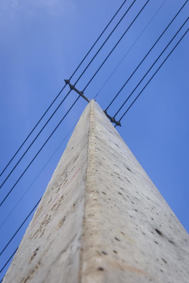 Concrete pole concept for electrical wiring. photo