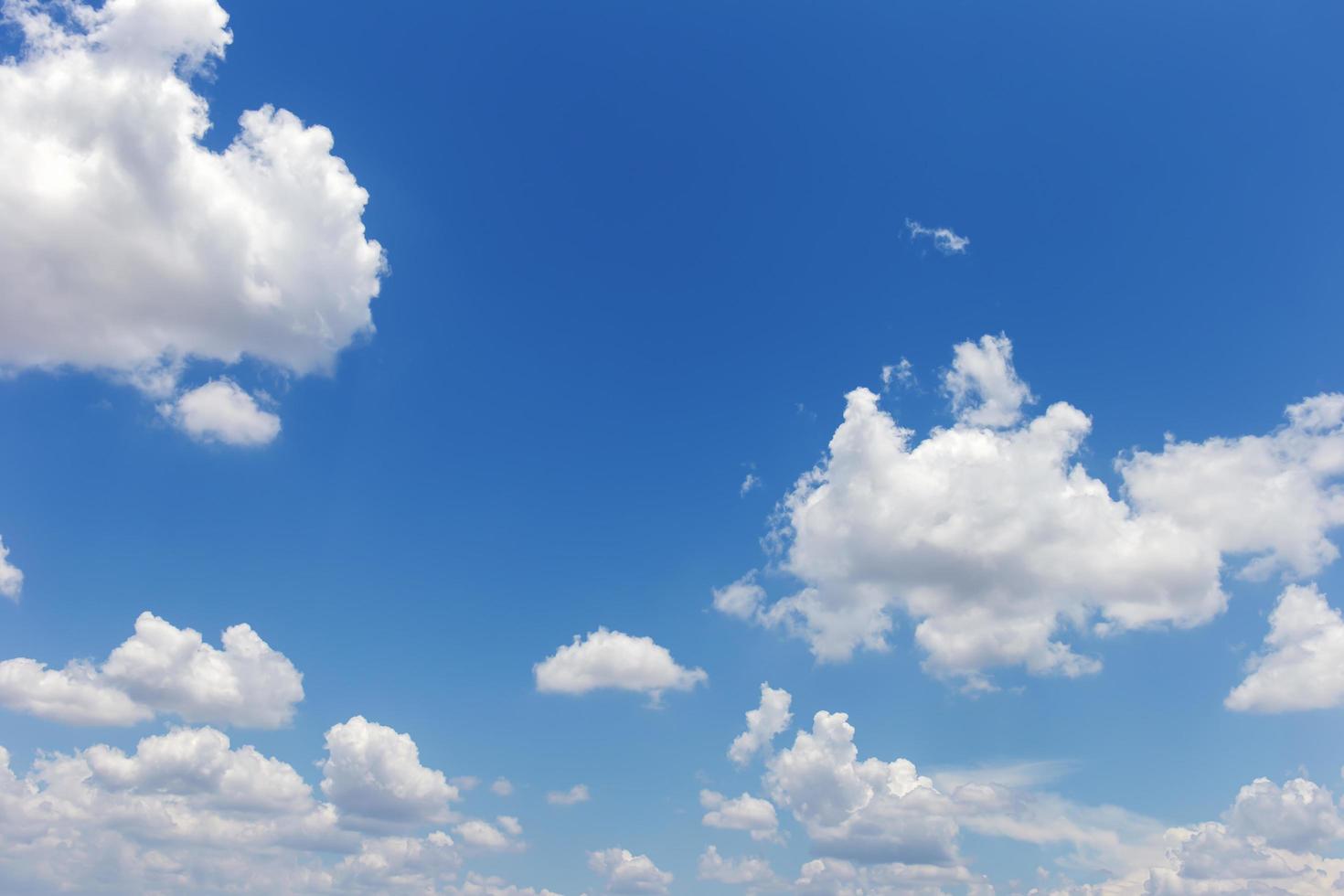 Blue sky background with clouds photo