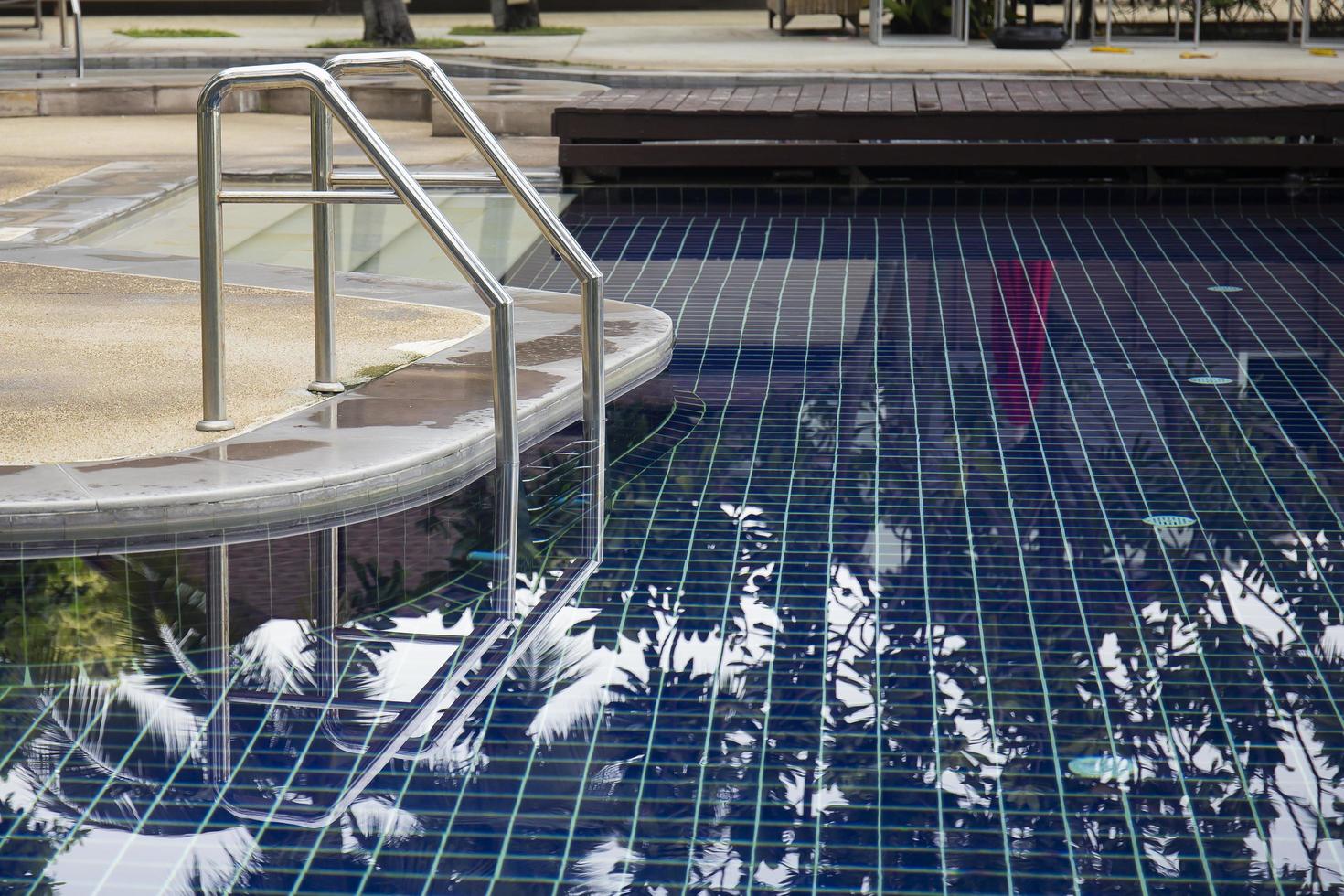 Stainless steel handrails by the pool. photo