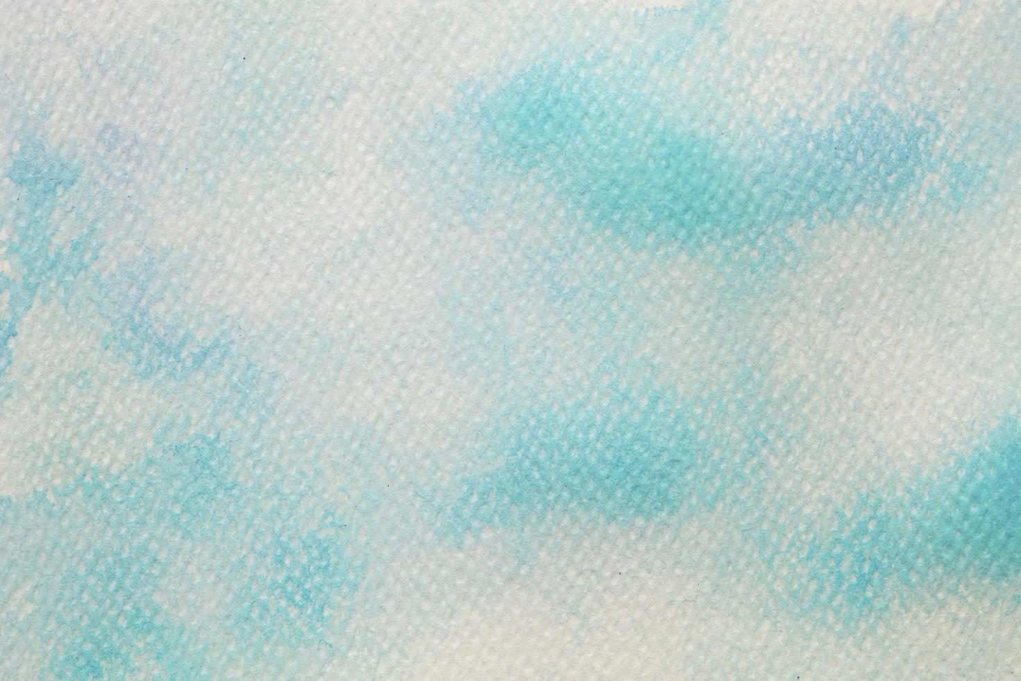 Blue watercolor on white paper, abstract background photo