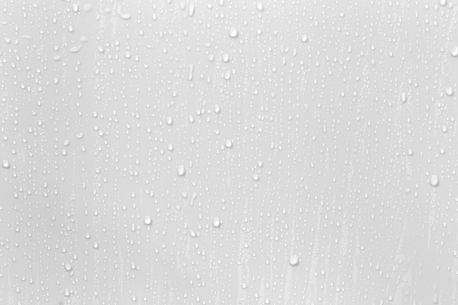 The concept of raindrops falling on a gray background Abstract wet white surface with bubbles on the surface Realistic pure water droplet water drops for creative banner design photo