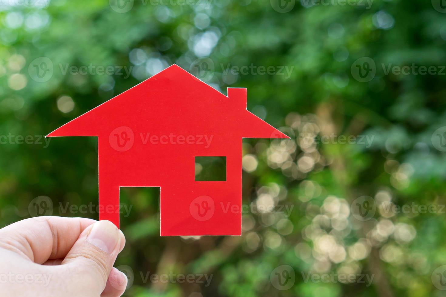 Hand with  house shape. new house buy concept photo