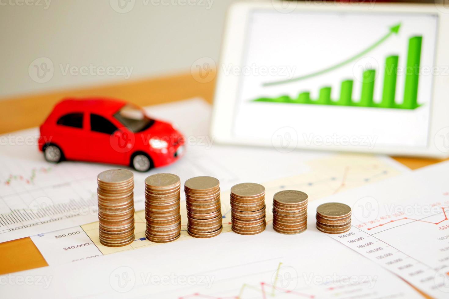 Photo of document some graphics with calculator and car and money