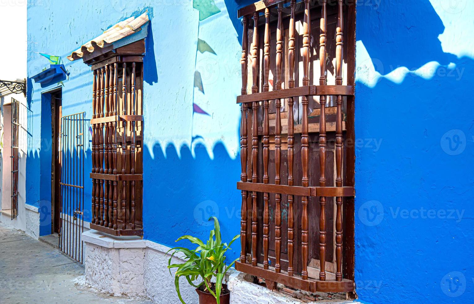 Colombia, Scenic colorful streets of Cartagena in historic Getsemani district near Walled City, Ciudad Amurallada, a UNESCO world heritage site photo