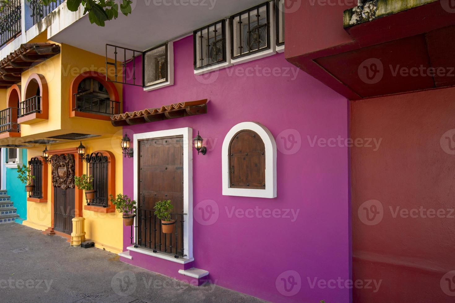 Restaurants and cafes with ocean views on Playa De Los Muertos beach and pier close to famous Puerto Vallarta Malecon, the city largest public beach photo