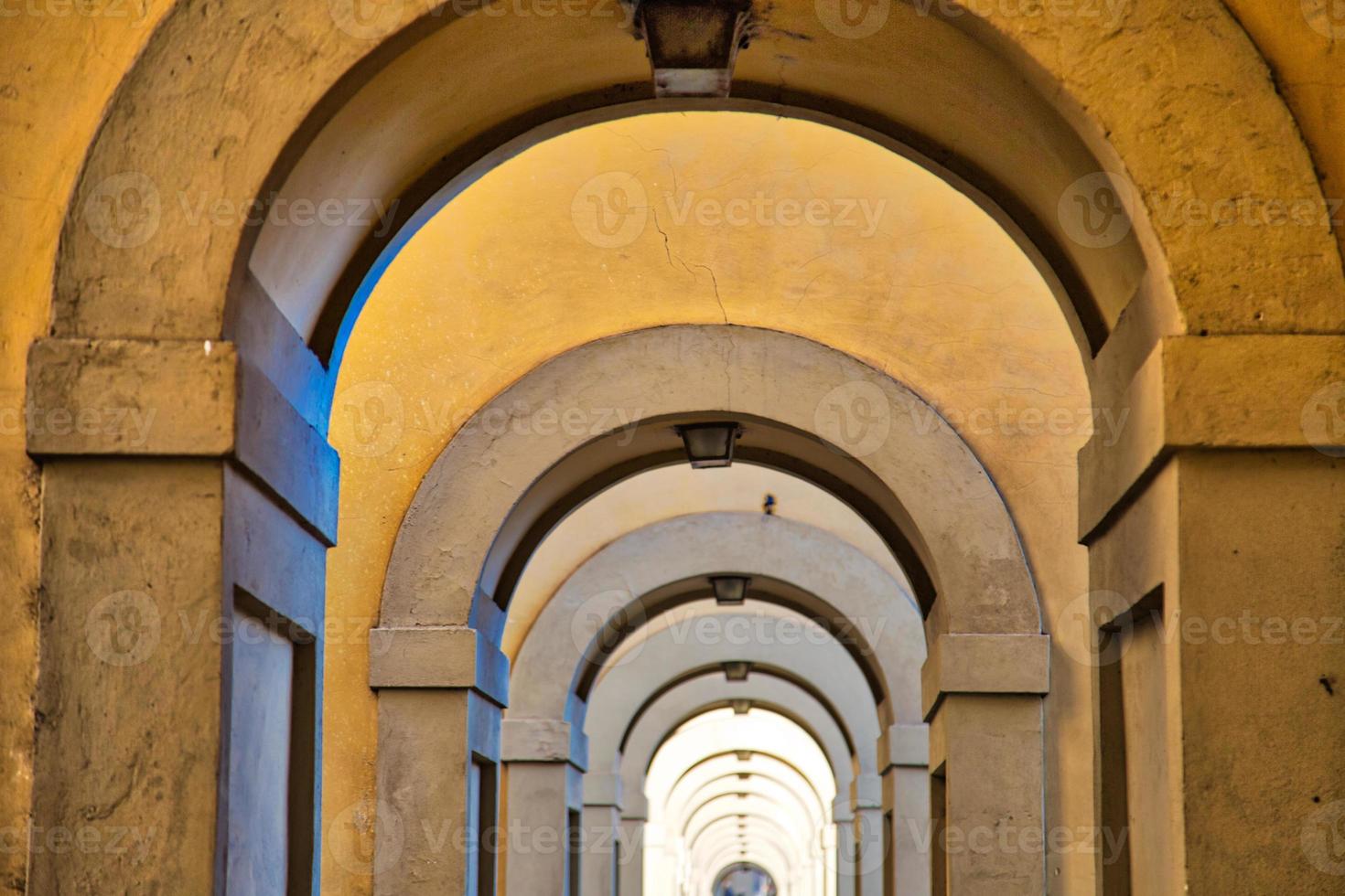 Florence streets near landmark bridge Ponte Vecchio photo