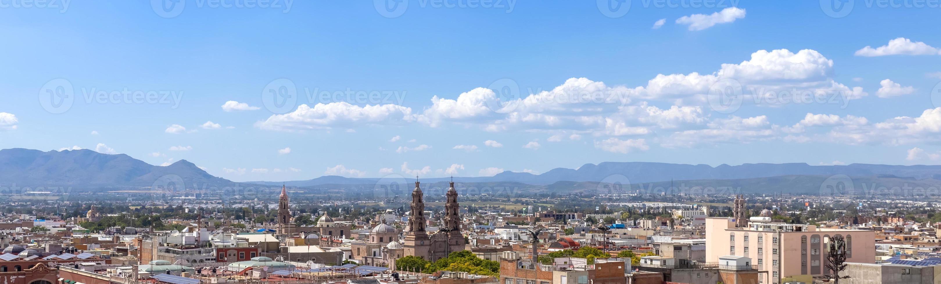 Central Mexico, Aguascalientes. Panoramic view of colorful streets and colonial houses in historic city center near Cathedral Basilica, one of the main city tourist attractions photo