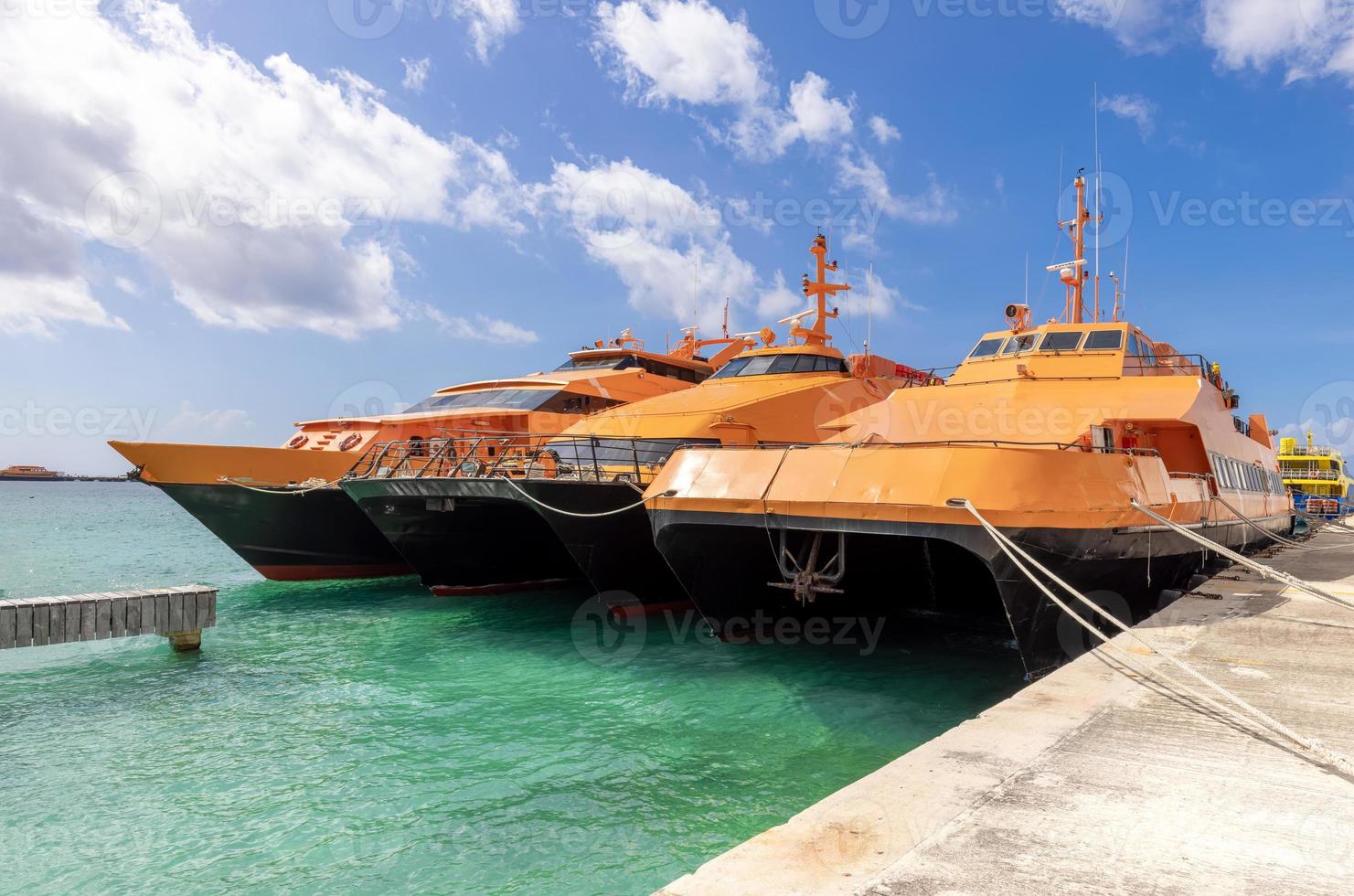 High-speed Cozumel ferry at the terminal of San Miguel de Cozumel waiting for passengers to Playa del Carmen and other tourist destinations photo