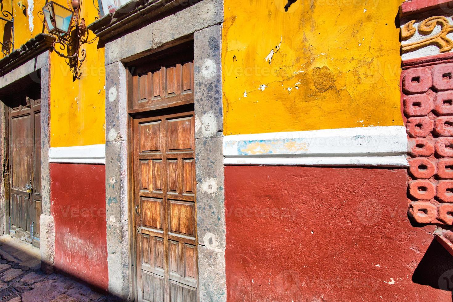 Colorful buildings and streets of San Miguel de Allende in historic city center photo