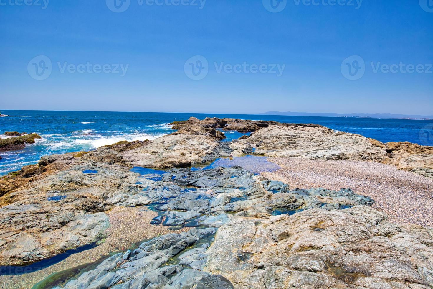 Puerto Vallarta, Conchas Chinas beach and ocean coastline photo