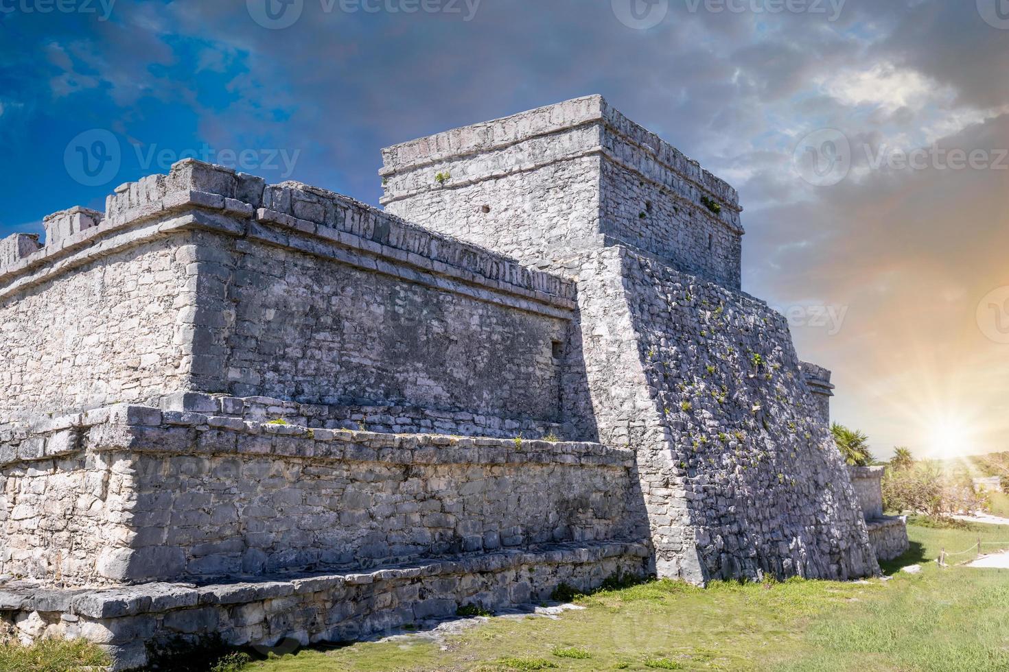 Pyramid El Castillo, the Castle, in Tulum Archaeological Zone with Mayan pyramids and ruins located on the scenic ocean shore of Quintana Roo province photo