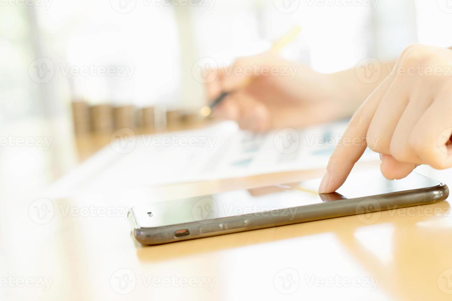 Women using her Smartphone photo